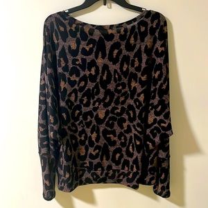 Medium, lightweight sweater. Purchased from Kaley Jase Boutique.